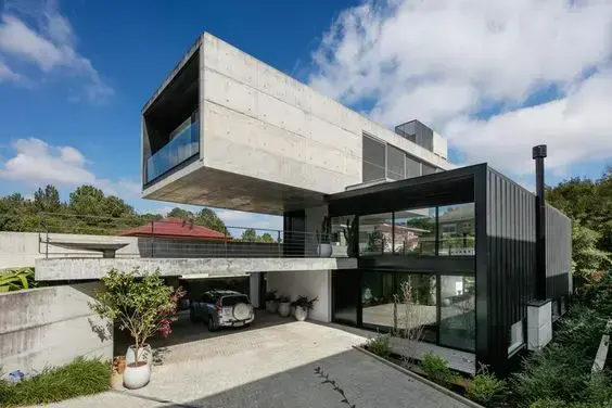 Concreto armado: casa com viga em balanço (foto: Biselli Katchborian Arquitetos)