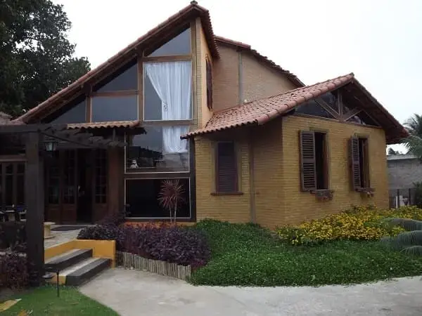 6. casa de tijolo ecológico com janelas de vidro (foto: F.Soares Arquitetura)