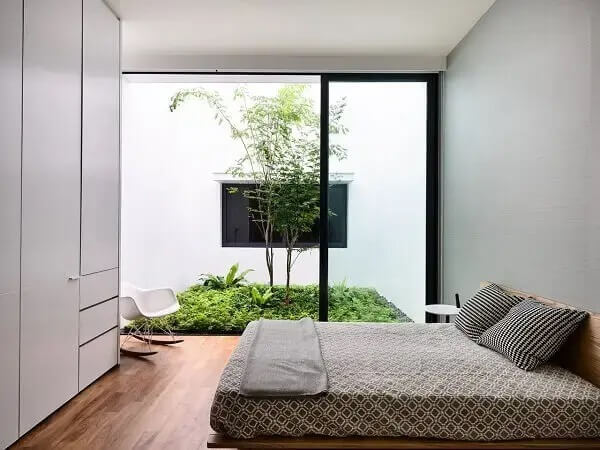 Quarto de casal com jardim de inverno simples