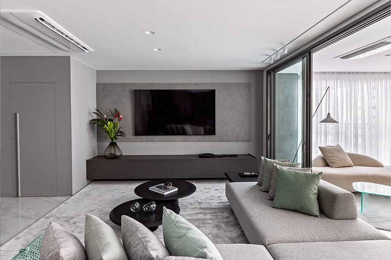 Projeto: Martins Galera| A sala de estar se conecta através do sofá ilha com a varanda gourmet, o living e a sala de jantar