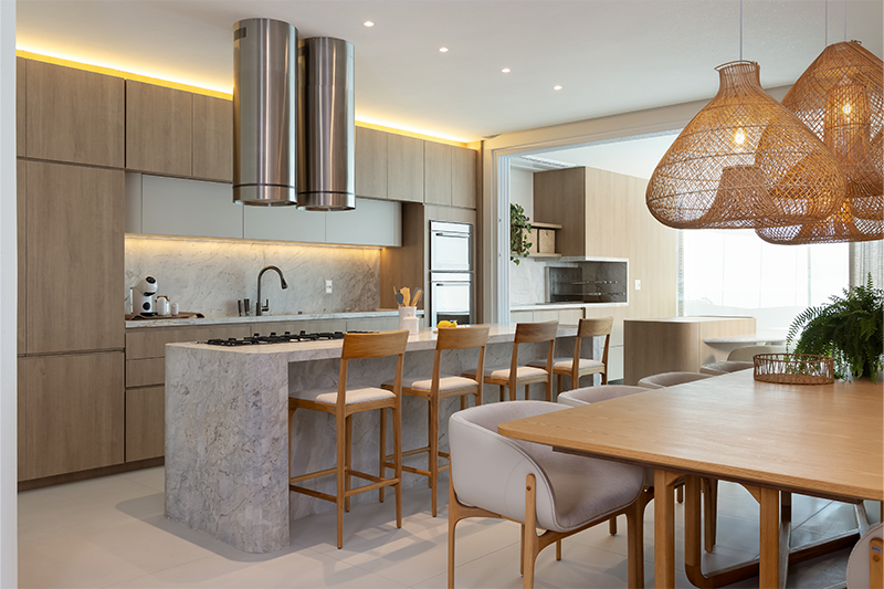 Projeto: Bo. Arch Studio | A cozinha e a varanda foram integradas dando a sensação de um ambiente mais amplo.