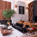 Sofá preto: como combinar na decoração + 10 projetos reais